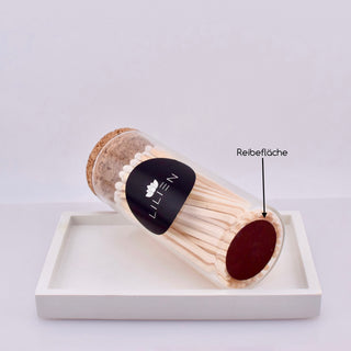 Streichhölzer in Glasflasche